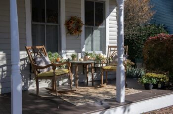 Front Porch With Beautiful Light Hitting The Outdoor Furniture Set.